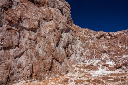 Salt mine wall detailed view under clear skyの写真素材