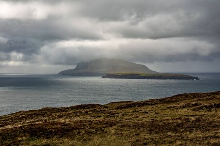 Dark cloudy and stormy sky over Faroe Islands