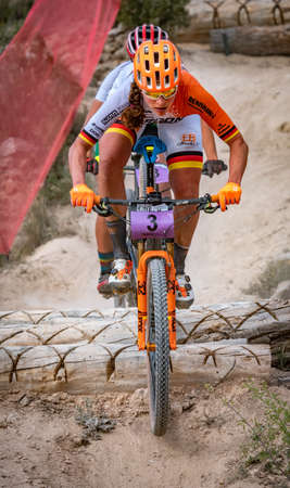 Elisabeth Brandau descending the trunks zone in MTB championshipのeditorial素材