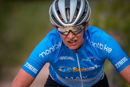 Unidentified female rider participates in MTB championshipのeditorial素材