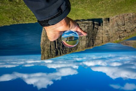 Sorvagsvatn lake cliffs over the ocean through crystal, Faroe Islandsの写真素材