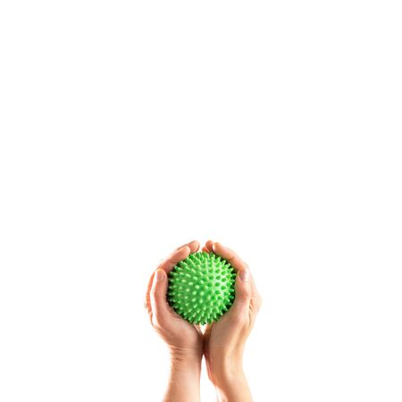 Hands holding in control coronavirus over whiteの写真素材