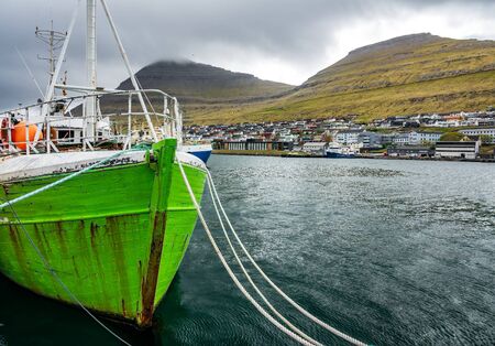Fishing port with boat in Klaksvik, Faroe Islandsの写真素材