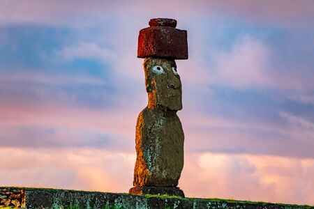 Isolated moai with tail light at duskの写真素材