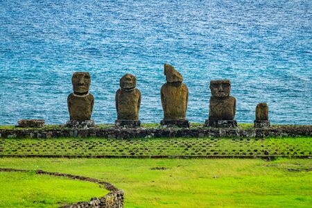 Moai platform with several statues in different conservationの写真素材