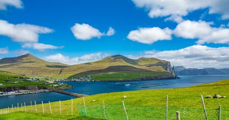 Sandavagur town with fish farms, Witchs Fingerの写真素材