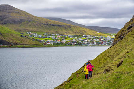 Chinese people group hiking in Faroe Islandsのeditorial素材