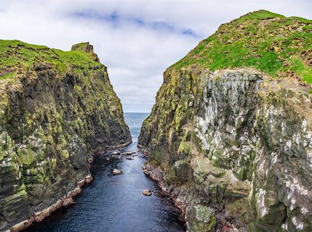 Narrow space of ocean between two isletsの写真素材