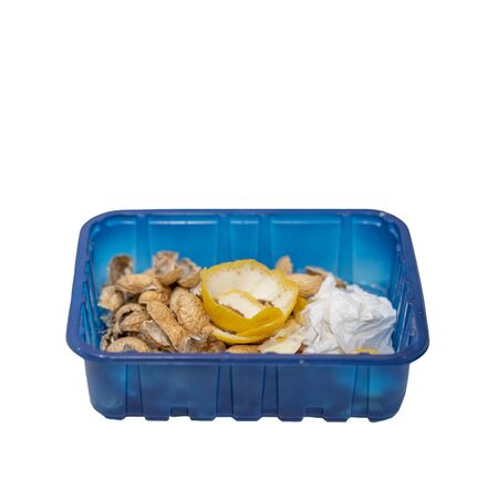 Plastic container reutilized for garbage over whiteの写真素材