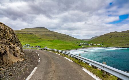 Road to iconic small village in Faroe Islandsの写真素材