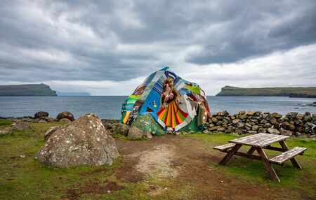 Eldgos and frumskogur the boulder covered with clothes in Sandoy islandの写真素材