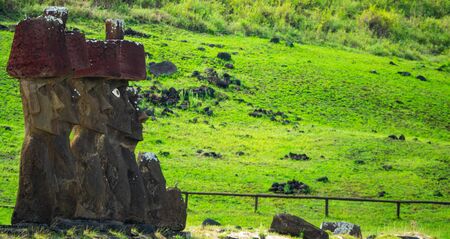Profile view of moai platform against greenの写真素材