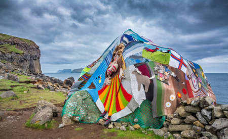 Eldgos and frumskogur boulder covered with clothesの写真素材