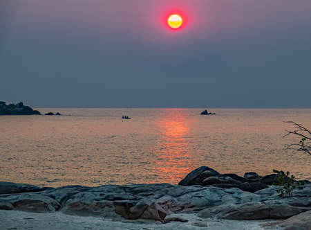 Sunrise over Malawi lake with fishing boatsの写真素材