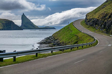 Spectacular panoramic road around the fjord in Faroe Islandsの写真素材