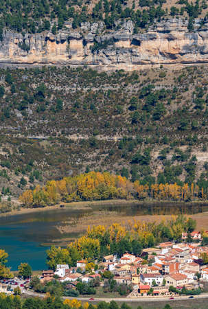 Una village near the lake under the rocky mountainsの写真素材