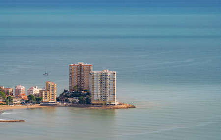 Buildings till the end of the coastlineの写真素材