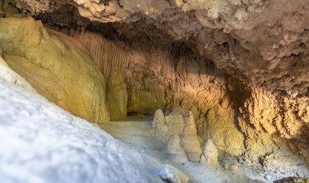 The end of the cave with stalactitesの写真素材