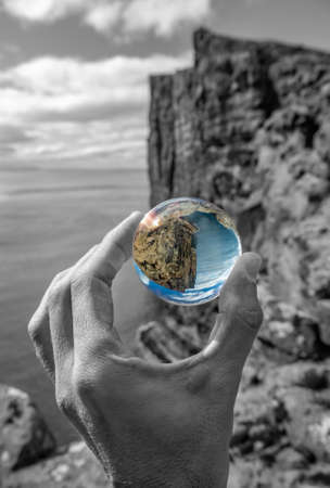Crystal ball colorful view of high cliffsの写真素材