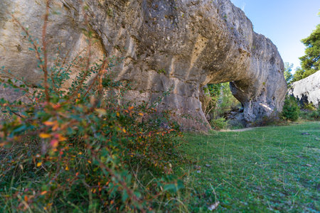 Large hole deep into the boulder, profile viewの写真素材