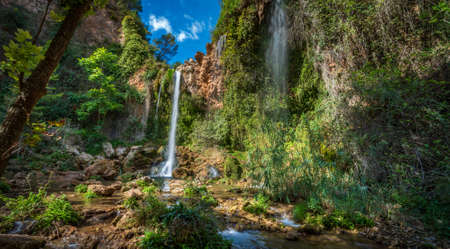 Waterfalls at the end of the valleyの写真素材