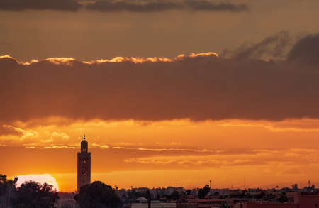 Sunset over Marrakech city skyline in Moroccoの写真素材