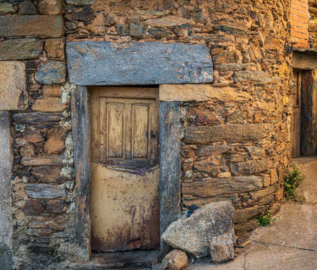 Old vintage wooden door with slate jambの写真素材