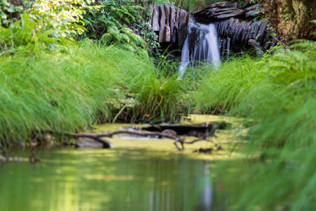 Waterfall long exposure, slate dam and streamの写真素材