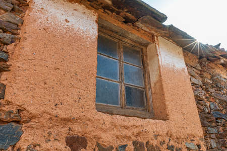 Old antique wooden window and facadeの写真素材