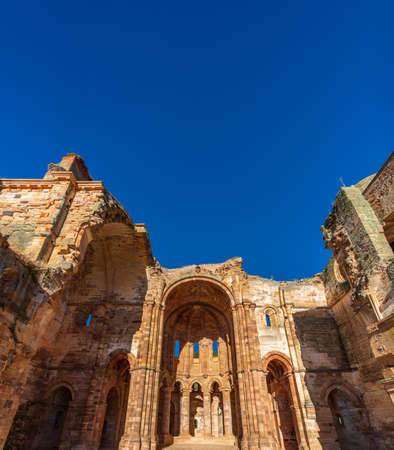 Old abandoned cathedral columns and dome under the skyの写真素材