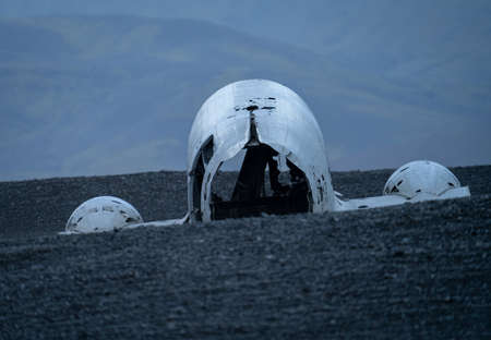 Wreck of and airplane in Iceland, long shot, rear viewの写真素材