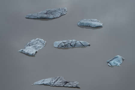 Icebergs isolated in the middle of the lakeの写真素材