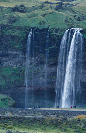 Seljalandfoss Waterfall in Iceland from the distance, vertical compositionの写真素材