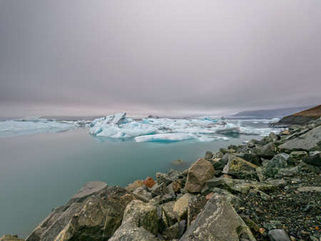 Ice lagoon and glacier long exposure, cloudy day in Jokusarlonの写真素材