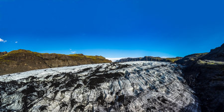 Massive glacier panorama under clear blue skyの写真素材