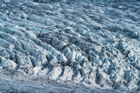 Massive glacier texture background, long shot with cracksの写真素材