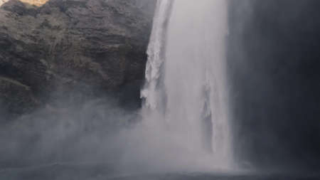 Massive skogafoss waterfall in super slow motionの写真素材