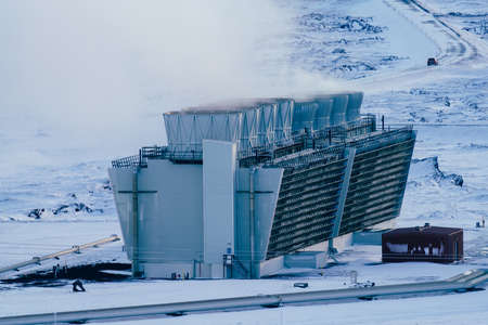 Geothermic plant long shot over snow covered landscapeの写真素材