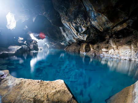 Blue waters of Grjotagja Cave in Icelandの写真素材