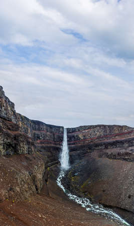 Hengifoss waterfall with red layers panorama