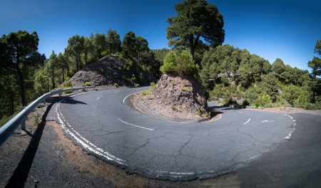 Massive u-shape curved mountain road panoramic viewの写真素材