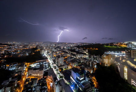 Spectacular Lightning Strike on City Skyline in Juiz de Fora, Brazilの写真素材