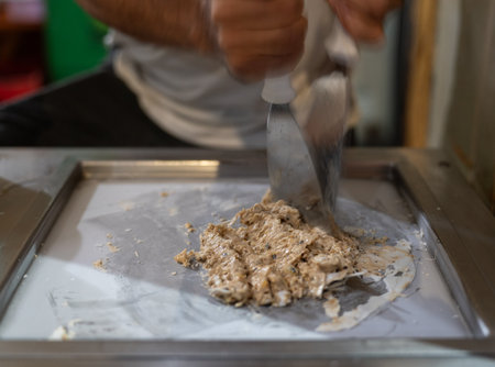 Artisan Ice Cream Expert Making Rolled Ice Cream Delicacyの写真素材