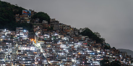 Hillside Favela in Brazil Illuminated at Nighttimeの写真素材