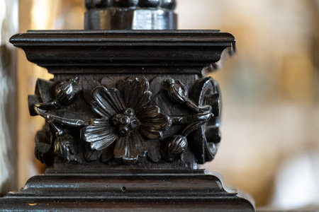 Intricately Carved Wooden Flower Detail on Furnitureの写真素材