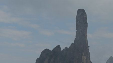 Rocky Pinnacle Shaped Like a Pointing Finger Reaching the Skyの写真素材