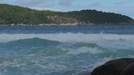 Slow motion video of waves crashing on rocky coastlineの写真素材