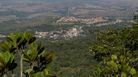Slow motion view of Tiradentes with church atop colonial housesの写真素材