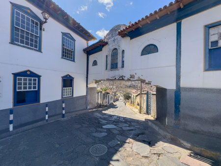 Traditional Cobblestone Street in Old Town with Blue Accentsの写真素材