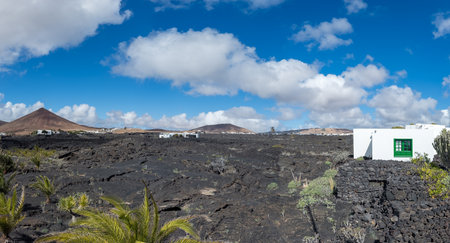 Volcanic Landscape with Traditional White Houses in Lanzaroteの写真素材